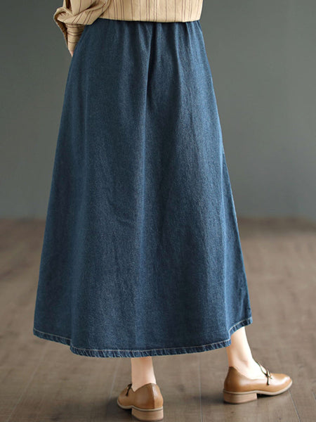 女性のアーティスティックなソリッドスプライスポケットルーズデニムスカート