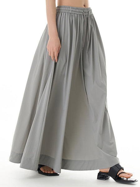 女性の夏のカジュアルソリッドドレープ巾着ルーズスカート