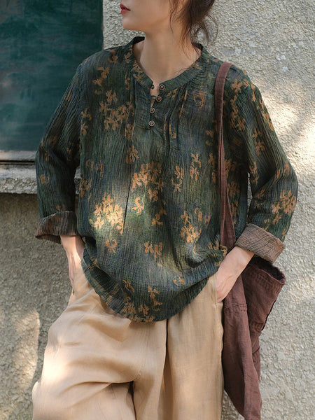女性のアーティスティックフラワーシャーリングボタンルーズラミーシャツ