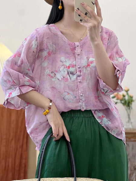 女性のアーティスティックなフラワーボタンルーズラミーシャツ