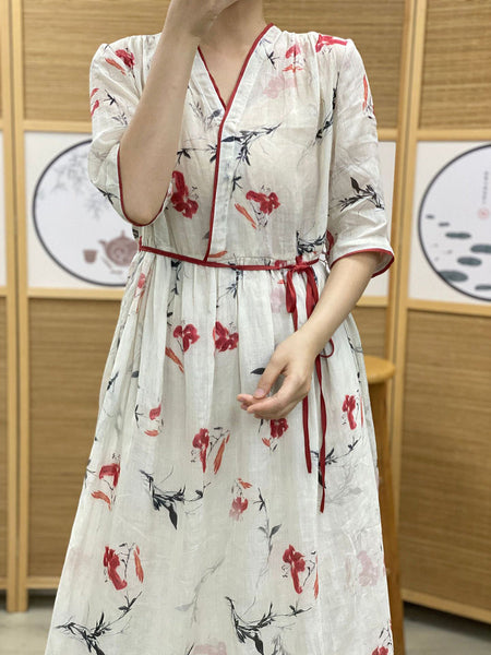 女性の夏の芸術的な花柄巾着 V ネック ルーズ ドレス