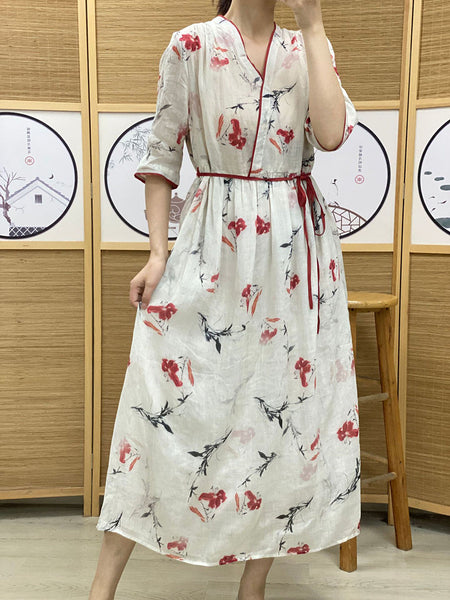 女性の夏の芸術的な花柄巾着 V ネック ルーズ ドレス
