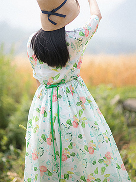 女性の芸術的なフラワー巾着プリーツ O ネックラミードレス