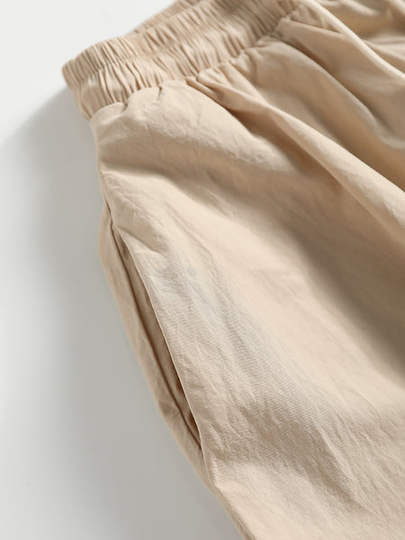 女性の夏のソリッドルーズポケット巾着コットンスカート